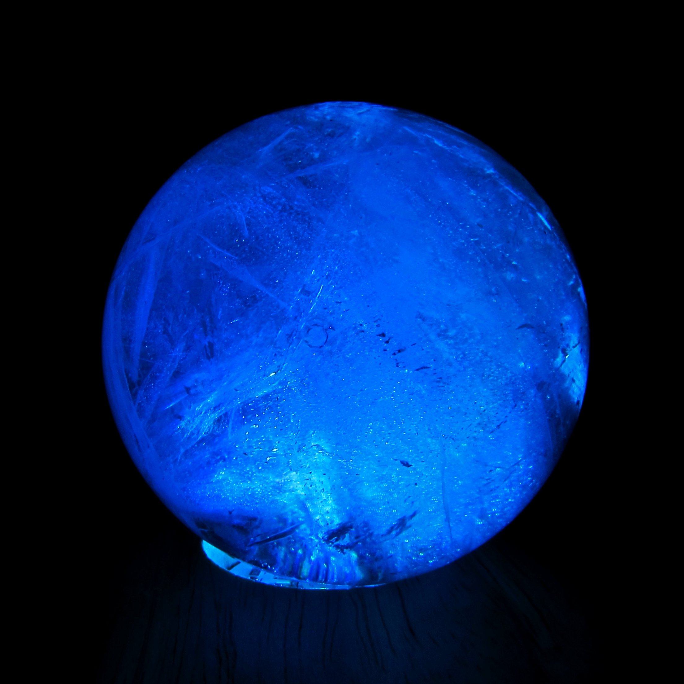 Blue illuminated crystal sphere